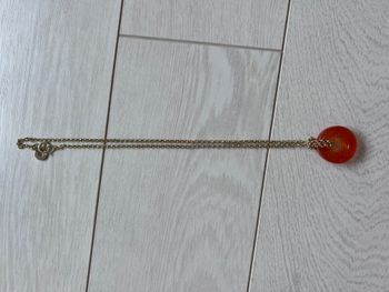 Collier Folli Follie chaine dorée et anneau orange