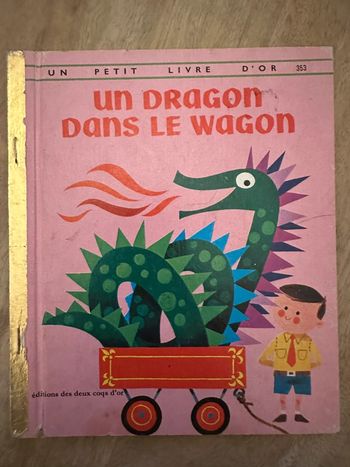 Livre ancien cartonné un petit livre d’or un dragon dans le wagon éditions deux coqs d’or