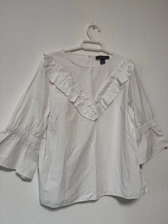 Blusa blanca volantes