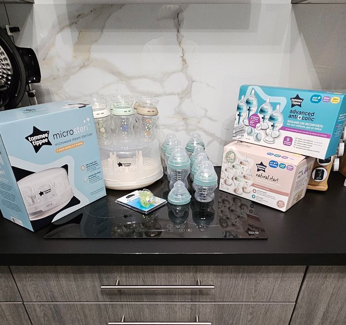 Lot biberons stérilisateur tommee tippee