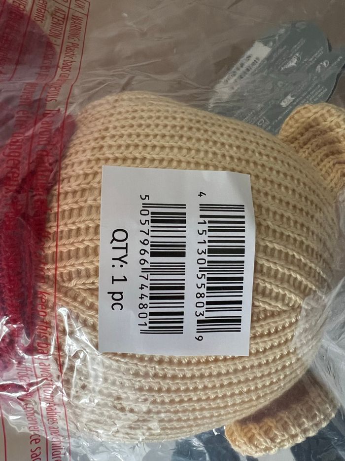 Peluche Winnie l’Ourson en Tricot + Clé 60e Anniversaire de Winnie l’Ourson - photo numéro 3