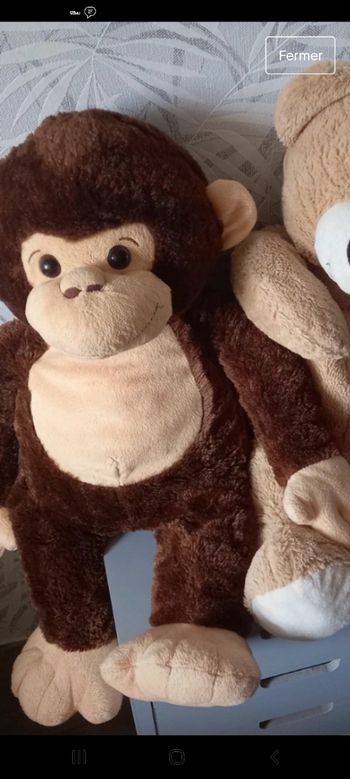 Grande peluche singe