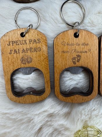 Porte clé ouvre bouteille