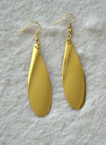 Boucles or neuves longues dorées création