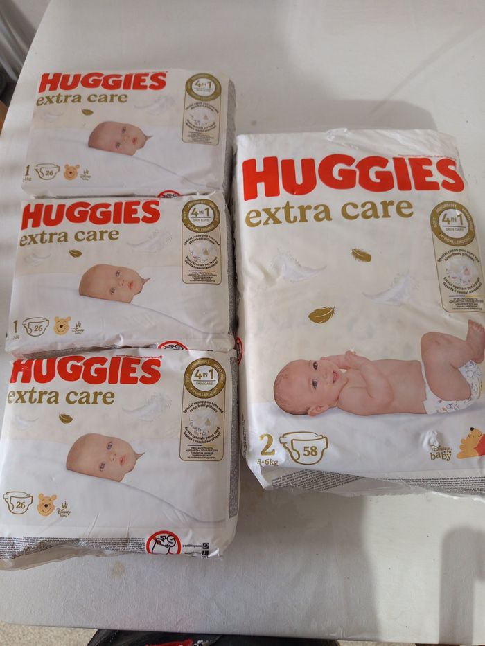 4 paquet de couche huggies a 24€