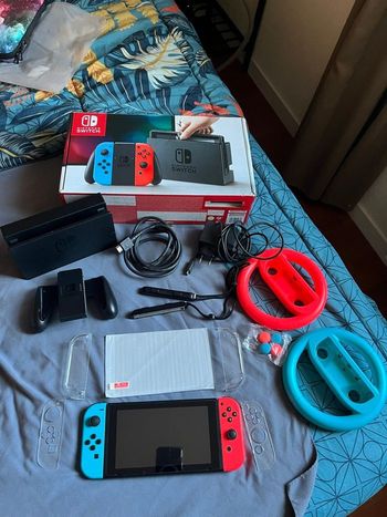 Console Nintendo switch + accessoires + jeux