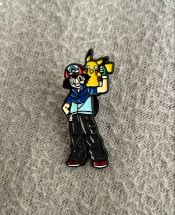 Pin’s Pokémon Sacha et Pikachu