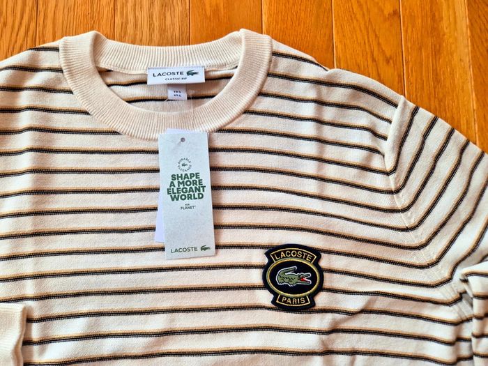 Pull "Lacoste" Blanc à rayures Taille L  Taille L neuf sous blister 100 % coton organique. - photo numéro 11