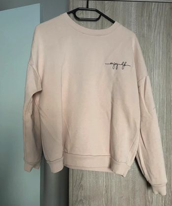 Pull sweat rose pale