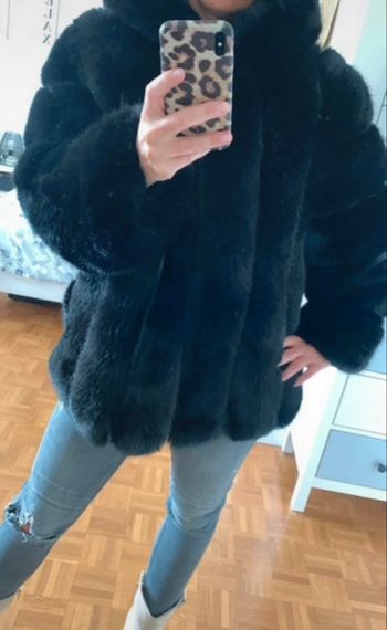 Manteau fausse fourrure noir