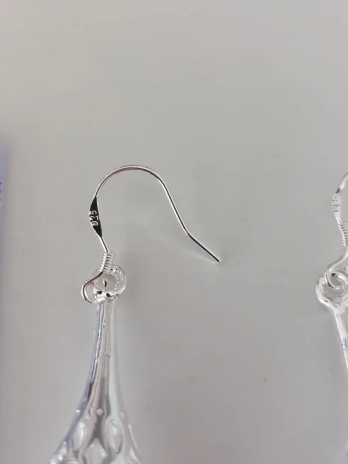 Boucles d'oreilles ajourées en argent - photo numéro 3