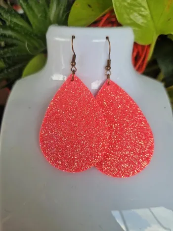 Boucles d'oreilles fantaisies ovale souple fuschia pailleté