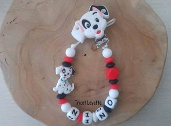 Attache tétine chien