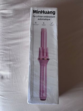 Fer à boucler rotatif 