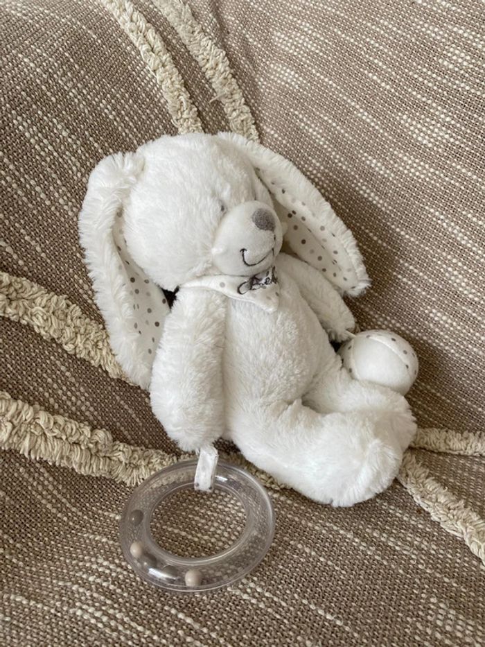 Peluche doudou 24cm pommette lapin d’éveil blanc à pois très bon état - photo numéro 2