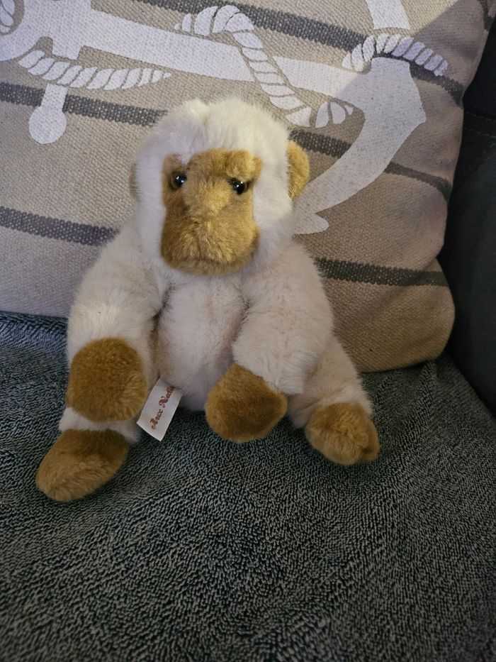 Peluche singe Aux Nations