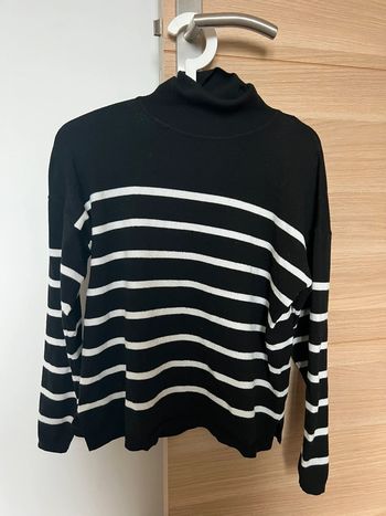 Pull col roulé