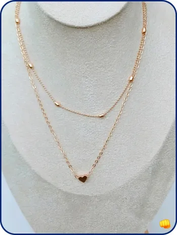 Collier doré double rang avec cœur – bijou fin et tendance femme
