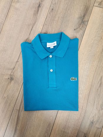 Polo lacoste bleu taille S neuf
