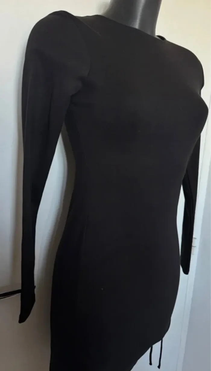 Robe noire sexy moulante neuve 38
