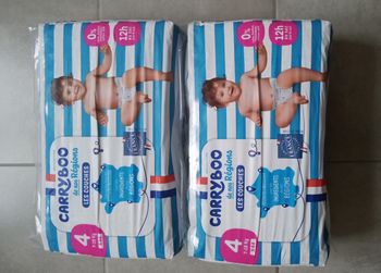 2 paquets de couches carryboo taille 4 