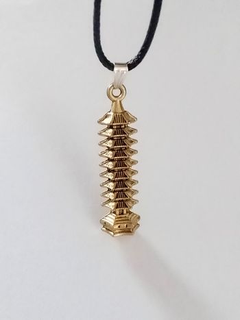 Collier corde de cire + pendentif chinois