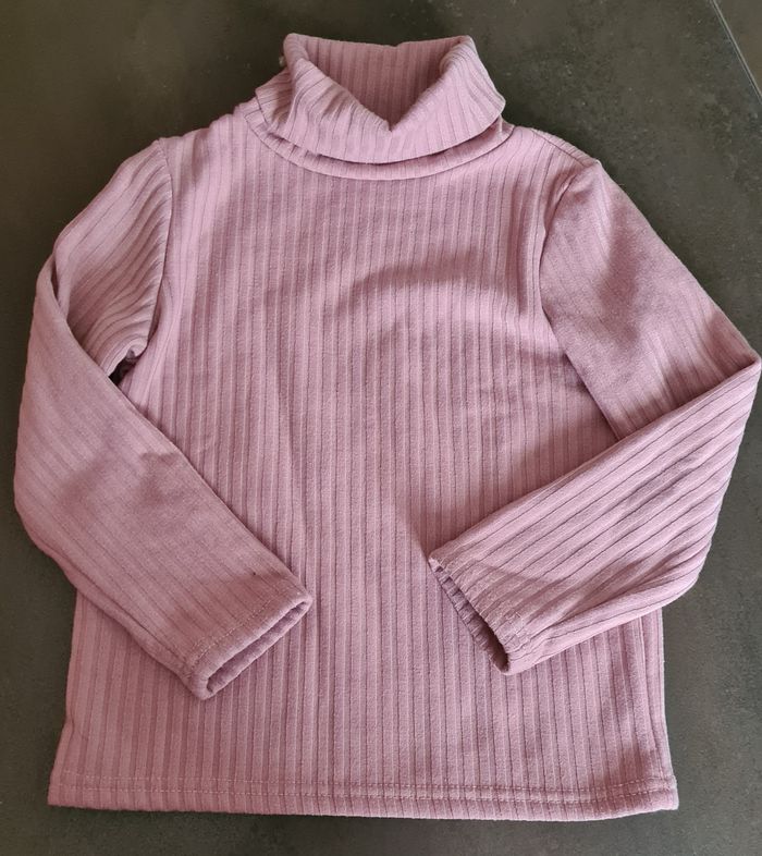 Pull col roulé doublé polaire T. 6 ans
