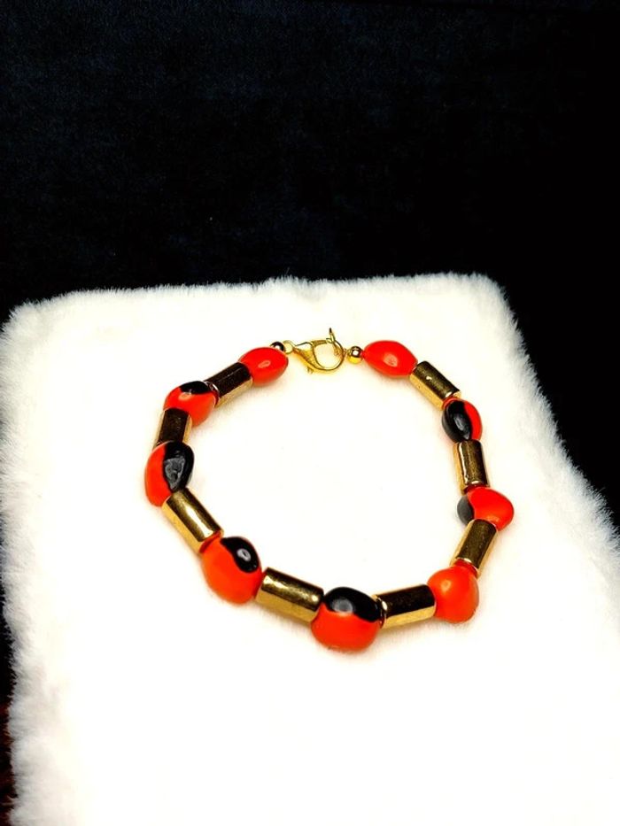 Magnifique bracelet en perles couleur doré et orange. - photo numéro 3