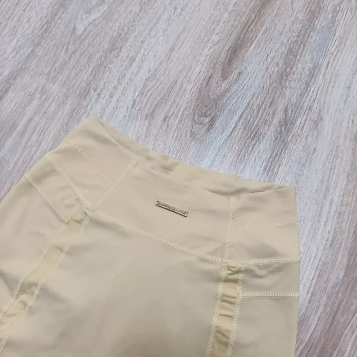 Short gymshark femme jaune S - photo numéro 4