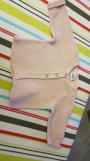 Gilet rose poudré tape à l'oeil