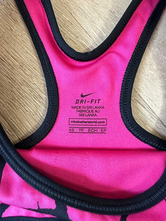 Brassière de sport Nike rose et noir taille 34 - photo numéro 4