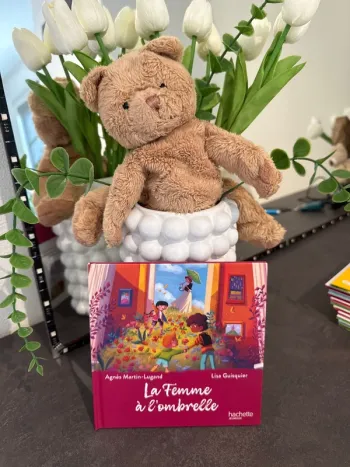 Livre Mac do la femme a l’ombrelle neuf