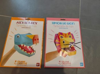 Marionnette Lion et T-Rex neuves 6€