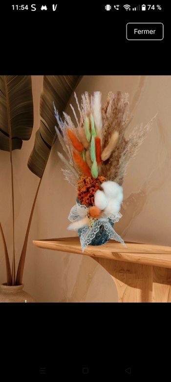 Bouquet de fleurs séchées avec vase en verre 