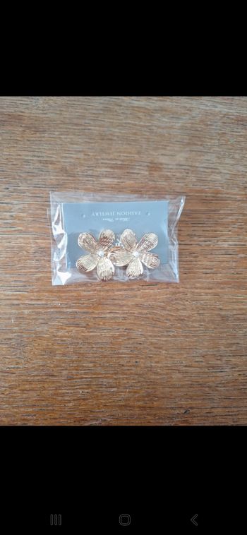 Boucle d'oreille fleur