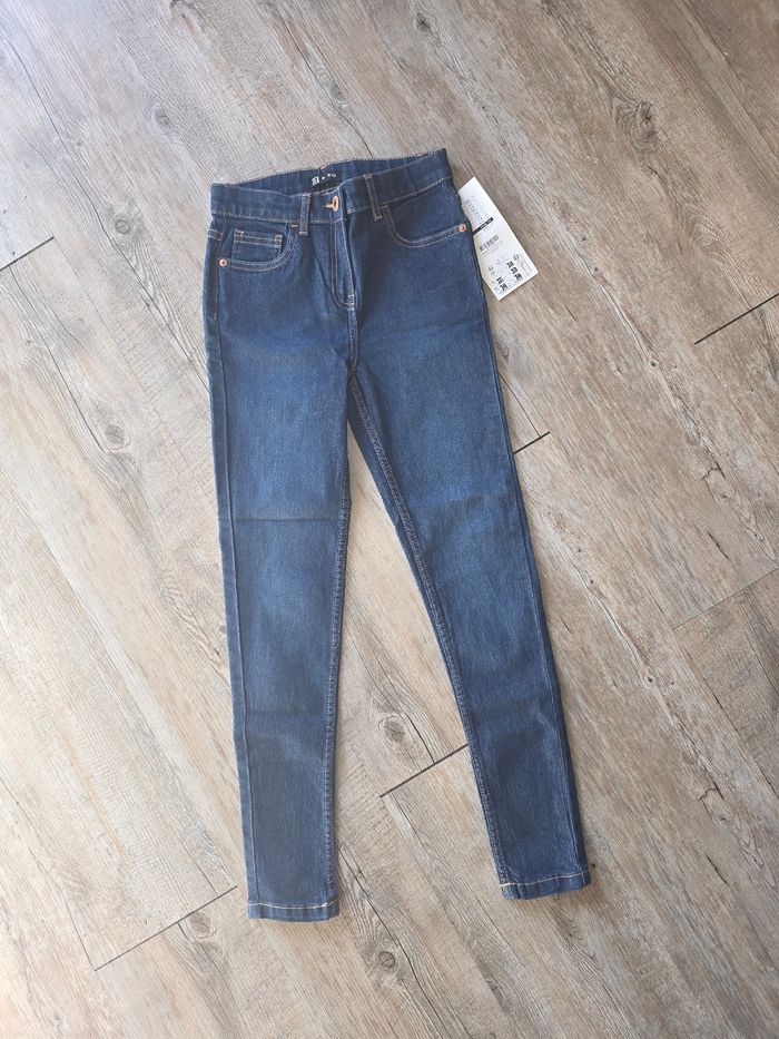 Jean fille bleu taille 11 - 12 ans neuf