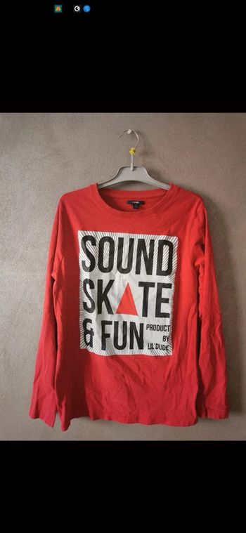 Tee-shirt garçon, ML, 14 ans.