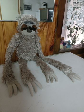 Peluche singes a longs bras