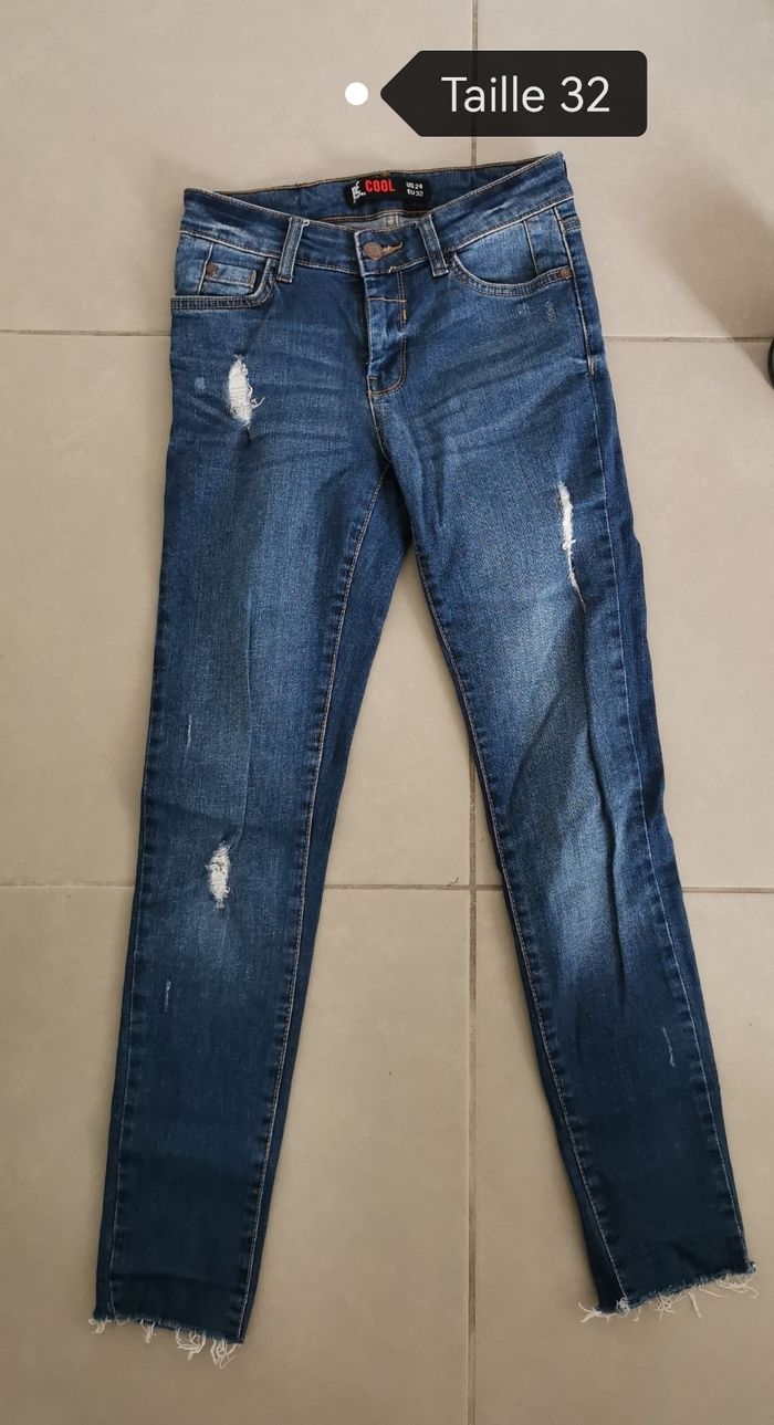 Jean à trous taille 32