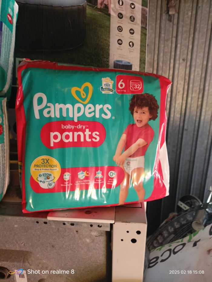 128 couches Pampers pants 4 packets taille 6