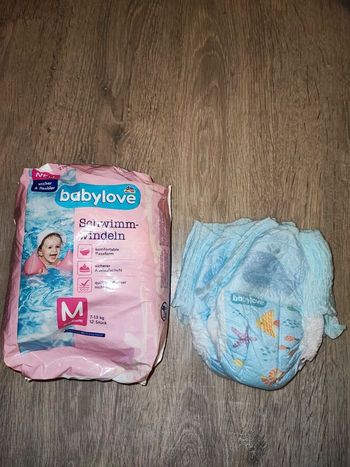 Paquet de couches 12  de piscine NEUF+ 2 couches