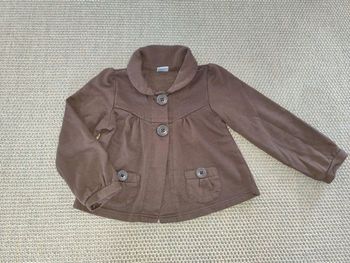 Gilet fille , 8 ans , très bon état