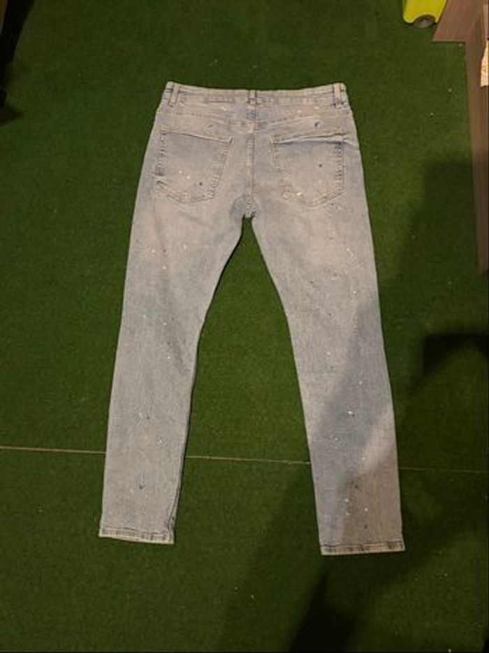 Jeans déchirer avec peinture dessus - photo numéro 3