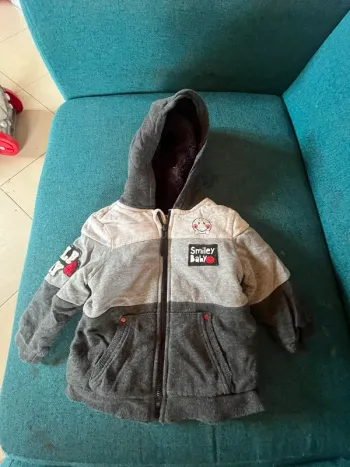 Gilet avec moumoute taille 71 cm