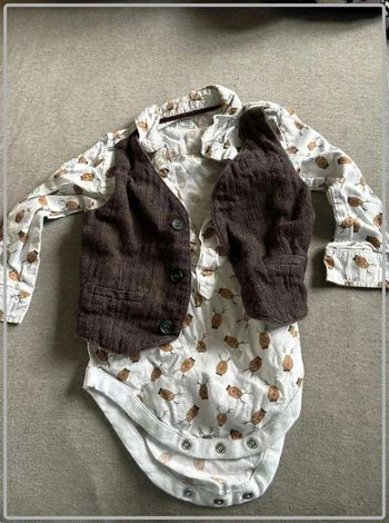 Tres  jolie body  habiller 6-9mois primark
