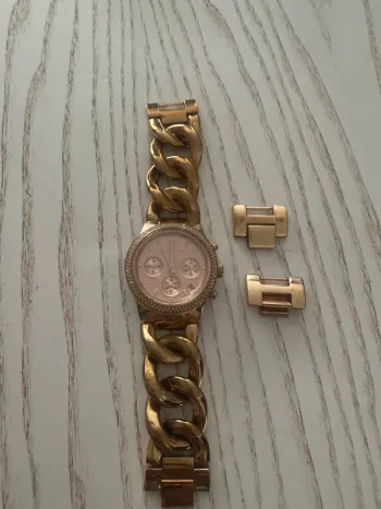 montre MK Michael Kors or rose avec 2 maillons supplémentaires