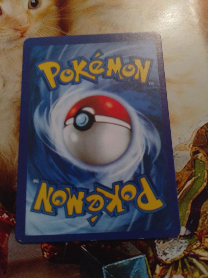 La carte Pokémon Charizard VMAX SV107/SV122 en version anglaise est une carte ultra rare de l’extension Shining Fates: Shiny Vault - photo numéro 2