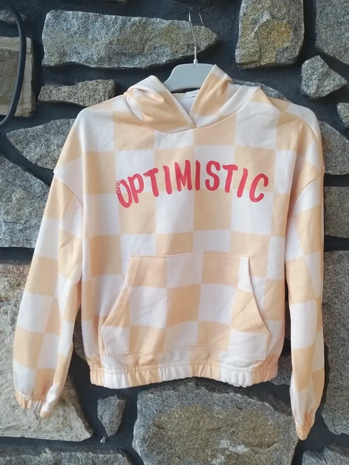 Pull court jaune et beige