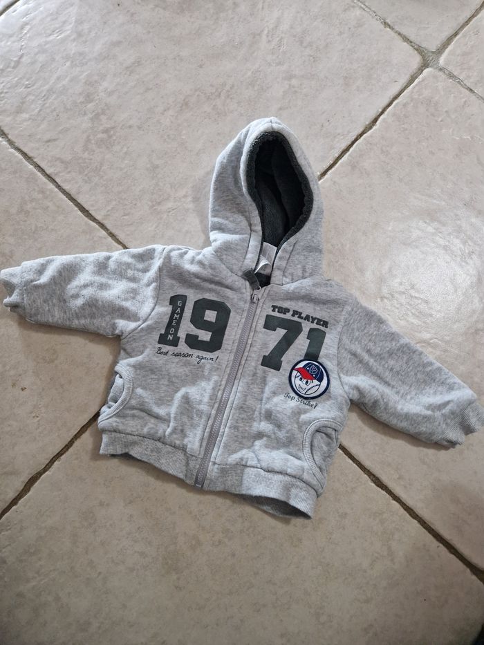 Gilet à capuche