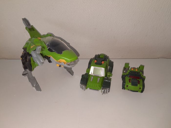 Lot véhicules/dinosaures switch and go
